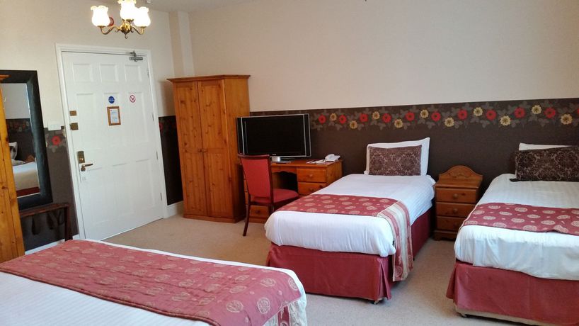 Imagen de la habitación del Hotel Haughton Hall. Foto 9