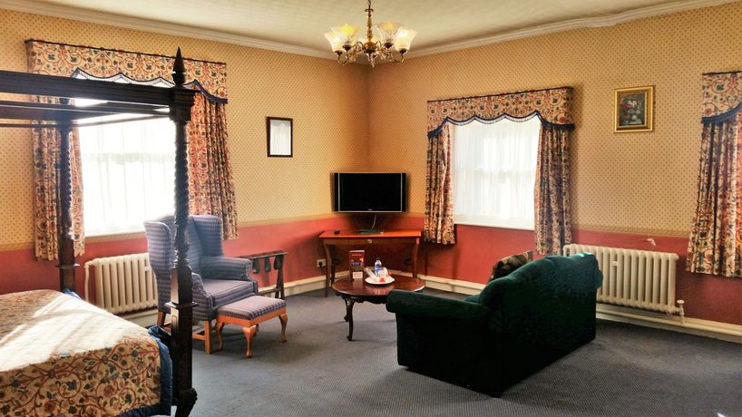 Imagen de la habitación del Hotel Haughton Hall. Foto 13