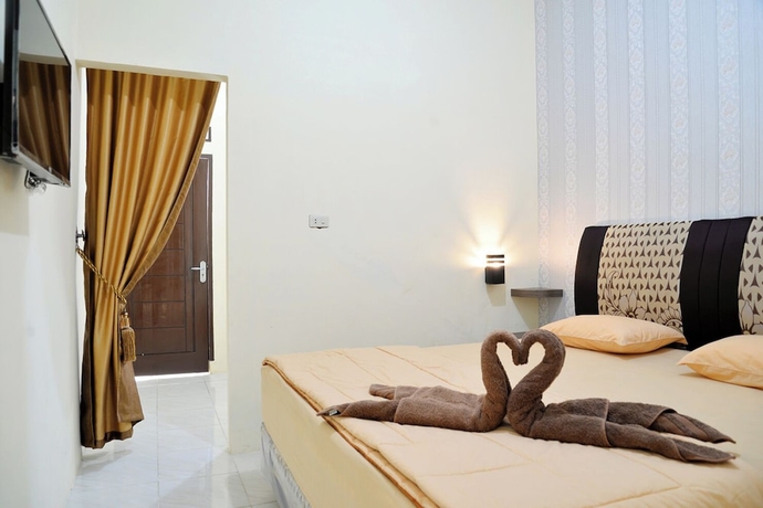 Imagen de la habitación del Hotel Haura syariah. Foto 5