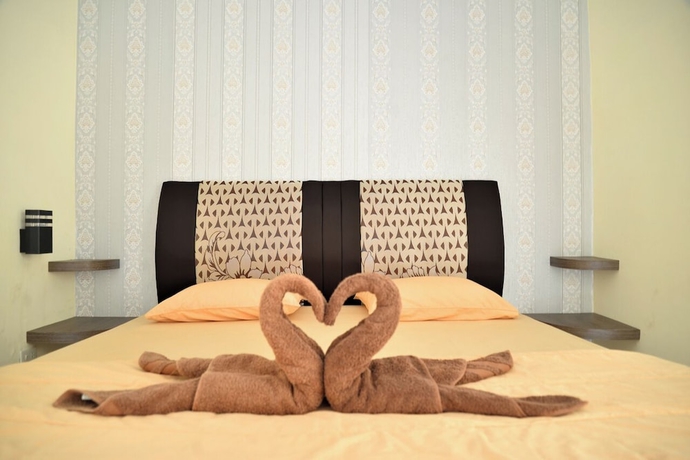 Imagen de la habitación del Hotel Haura syariah. Foto 8
