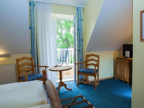 Imagen de la habitación del Hotel Haus Am Meer. Foto 9