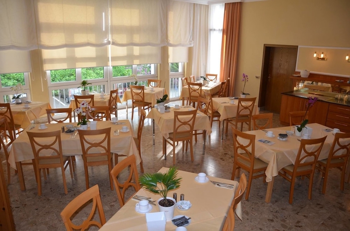 Imagen del bar/restaurante del Hotel Haus Am Park, Bad Homburg vor der H&ouml;he. Foto 5