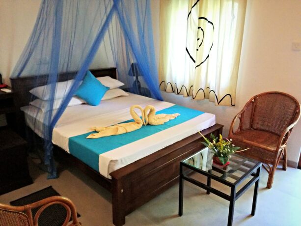 Imagen de la habitación del Hotel Haus Berlin Bentota. Foto 20