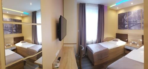 Imagen de la habitación del Hotel Haus Büderich. Foto 8