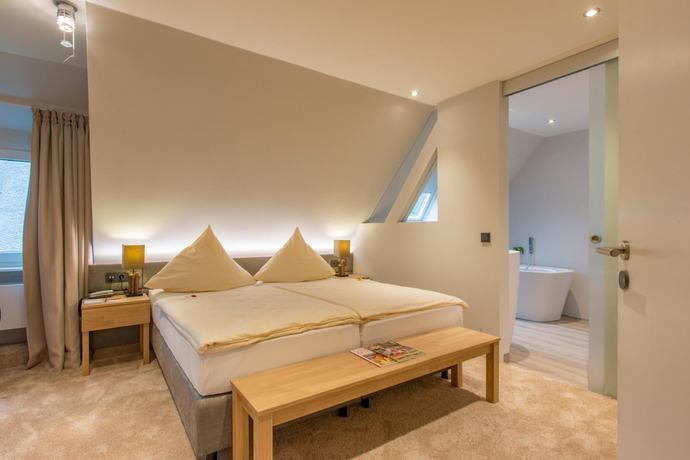 Imagen de la habitación del Hotel Haus Hochstein. Foto 8