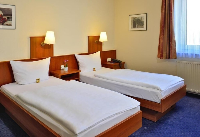 Imagen de la habitación del Hotel Haus Kronenthal. Foto 13