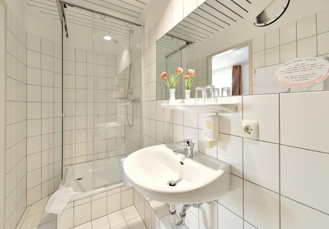 Imagen de la habitación del Hotel Haus Kronenthal. Foto 15