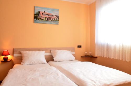 Imagen de la habitación del Hotel Haus Scheuten. Foto 9