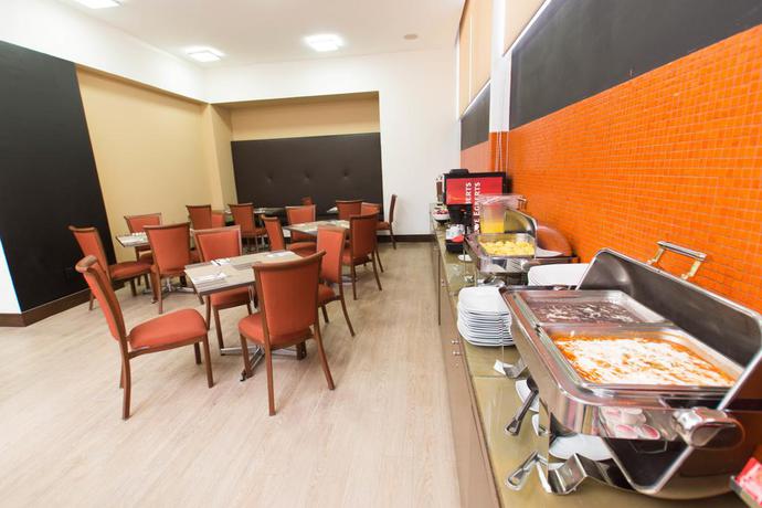 Imagen del bar/restaurante del Hotel Hausuites Santa Fe. Foto 2