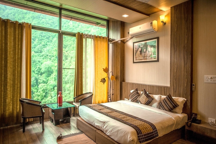Imagen de la habitación del Hotel Haut Monde Hill Stream Resort and Spa. Foto 18