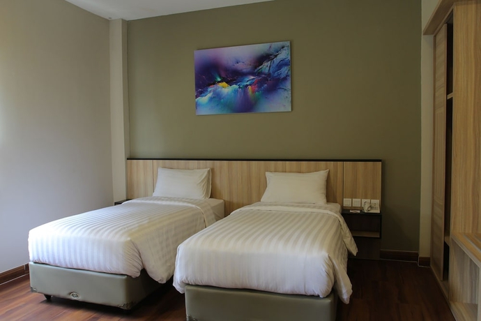 Imagen de la habitación del Hotel Havana Mutiara Belitung. Foto 7