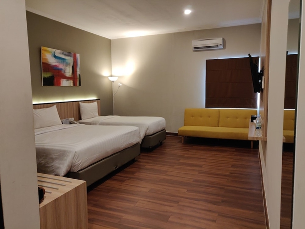 Imagen de la habitación del Hotel Havana Mutiara Belitung. Foto 11