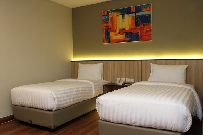 Imagen de la habitación del Hotel Havana Mutiara Belitung. Foto 12