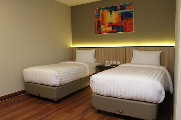 Imagen de la habitación del Hotel Havana Mutiara Belitung. Foto 14