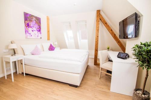 Imagen de la habitación del Hotel Havelser Hof. Foto 6