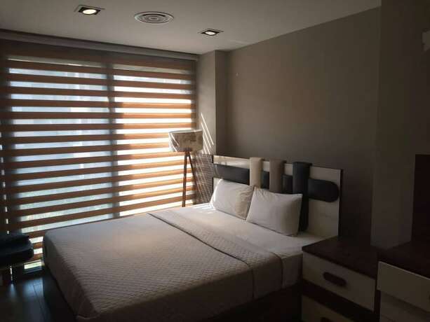 Imagen de la habitación del Hotel Haven City at Pearl in the City. Foto 20