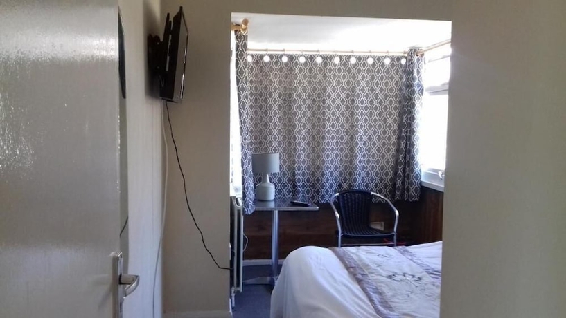 Imagen de la habitación del Hotel Haven House. Foto 11