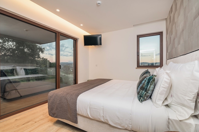 Imagen de la habitación del Hotel Haven Nature and Villas. Foto 12