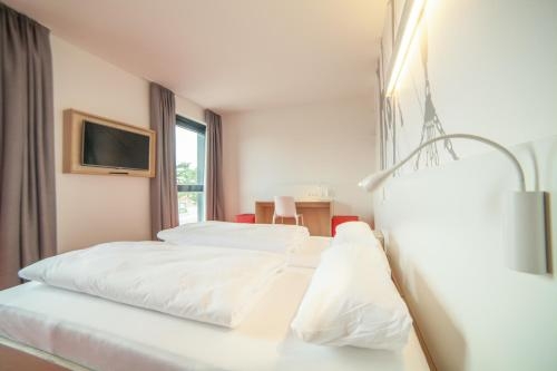 Imagen de la habitación del Hotel Havenhostel Cuxhaven. Foto 7