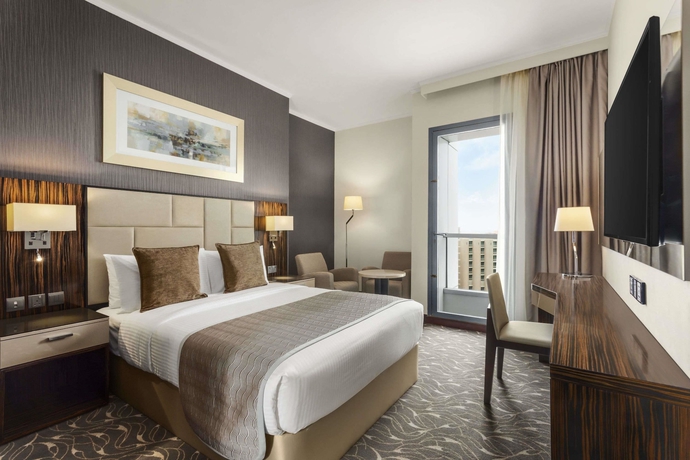 Imagen de la habitación del Hotel Hawthorn Suites By Wyndham Abu Dhabi City Centre. Foto 13