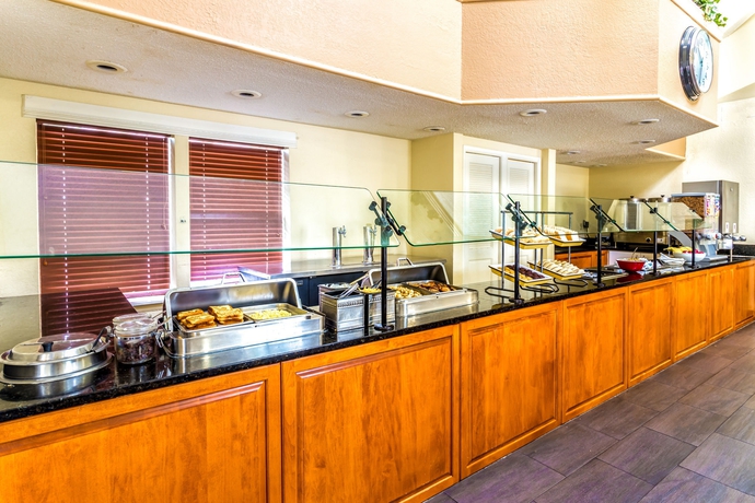 Imagen del bar/restaurante del Hotel Hawthorn Suites by Wyndham Orlando International D. Foto 4