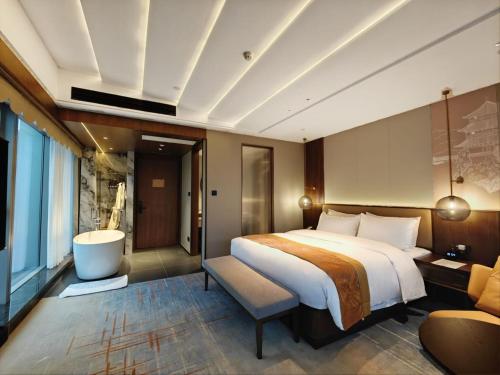Imagen de la habitación del Hotel Hawthorn by Wyndham Changsha Furong. Foto 3
