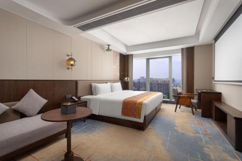 Imagen de la habitación del Hotel Hawthorn by Wyndham Changsha Furong. Foto 7
