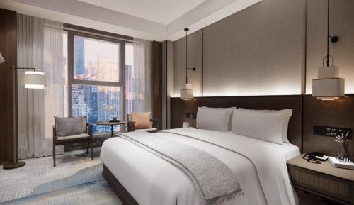 Imagen de la habitación del Hotel Hawthorn by Wyndham Changsha Furong. Foto 10
