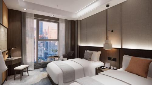 Imagen de la habitación del Hotel Hawthorn by Wyndham Changsha Furong. Foto 13