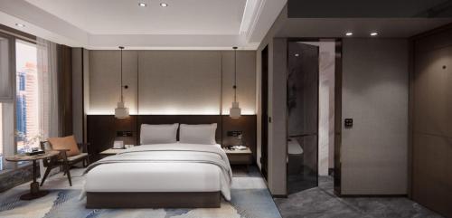 Imagen de la habitación del Hotel Hawthorn by Wyndham Changsha Furong. Foto 17