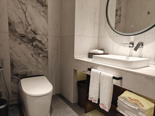 Imagen de la habitación del Hotel Hawthorn by Wyndham Changsha Furong. Foto 19