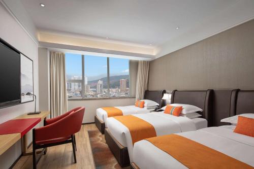 Imagen de la habitación del Hotel Hawthorn by Wyndham Dali Erhai Park. Foto 15