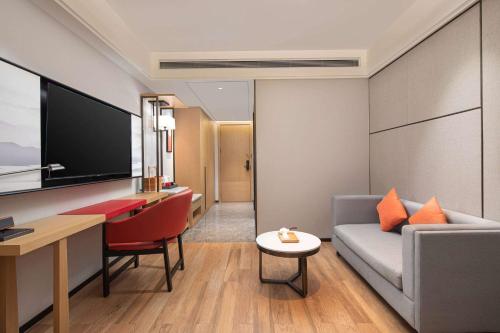 Imagen de la habitación del Hotel Hawthorn by Wyndham Dali Erhai Park. Foto 17