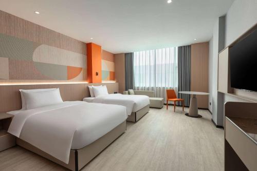 Imagen de la habitación del Hotel Hawthorn by Wyndham Guangzhou Baiyun Airport. Foto 9