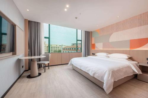Imagen de la habitación del Hotel Hawthorn by Wyndham Guangzhou Baiyun Airport. Foto 10
