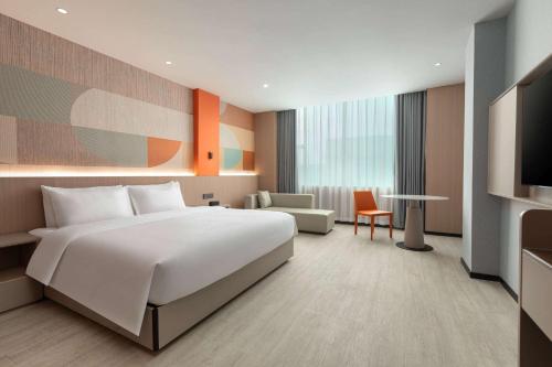 Imagen de la habitación del Hotel Hawthorn by Wyndham Guangzhou Baiyun Airport. Foto 11