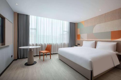Imagen de la habitación del Hotel Hawthorn by Wyndham Guangzhou Baiyun Airport. Foto 12
