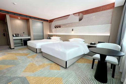 Imagen de la habitación del Hotel Hawthorn by Wyndham Guangzhou Baiyun Airport. Foto 13
