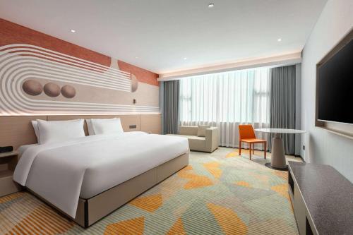 Imagen de la habitación del Hotel Hawthorn by Wyndham Guangzhou Baiyun Airport. Foto 14