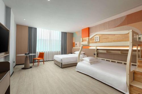 Imagen de la habitación del Hotel Hawthorn by Wyndham Guangzhou Baiyun Airport. Foto 16