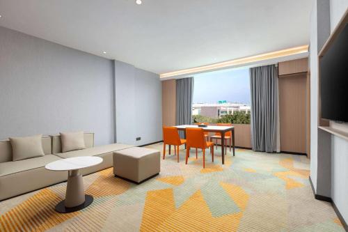 Imagen de la habitación del Hotel Hawthorn by Wyndham Guangzhou Baiyun Airport. Foto 20