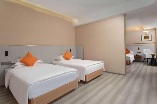 Imagen de la habitación del Hotel Hawthorn by Wyndham Honghe Mile Hot Spring. Foto 14