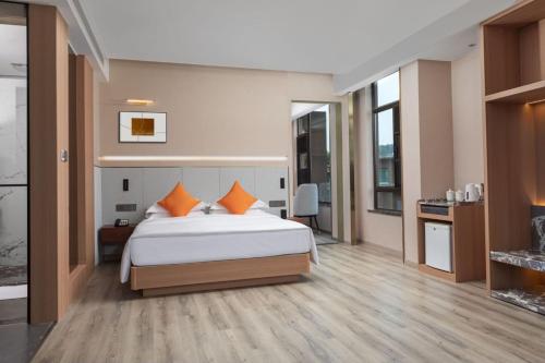 Imagen de la habitación del Hotel Hawthorn by Wyndham Honghe Mile Hot Spring. Foto 16