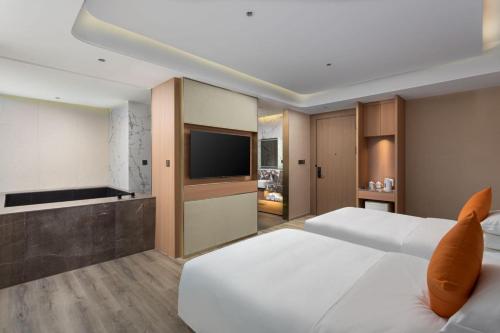 Imagen de la habitación del Hotel Hawthorn by Wyndham Honghe Mile Hot Spring. Foto 17