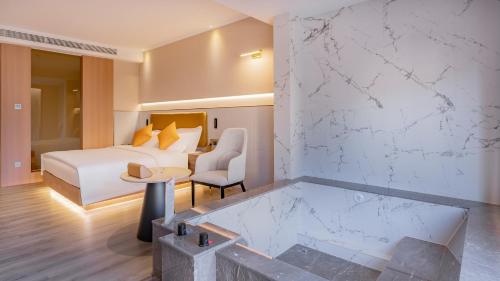 Imagen de la habitación del Hotel Hawthorn by Wyndham Honghe Mile Hot Spring. Foto 19