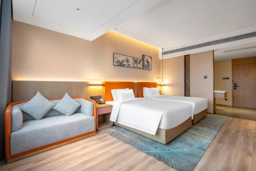 Imagen de la habitación del Hotel Hawthorn by Wyndham Xishuang Banna Jinghong. Foto 13