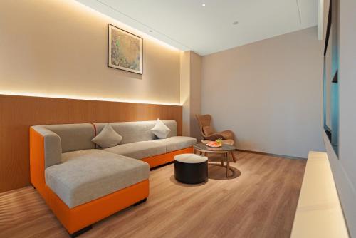Imagen de la habitación del Hotel Hawthorn by Wyndham Xishuang Banna Jinghong. Foto 15