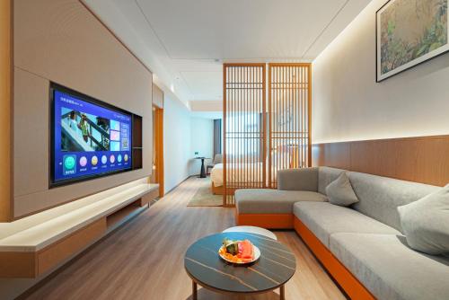 Imagen de la habitación del Hotel Hawthorn by Wyndham Xishuang Banna Jinghong. Foto 17
