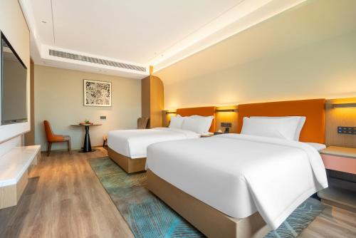 Imagen de la habitación del Hotel Hawthorn by Wyndham Xishuang Banna Jinghong. Foto 18