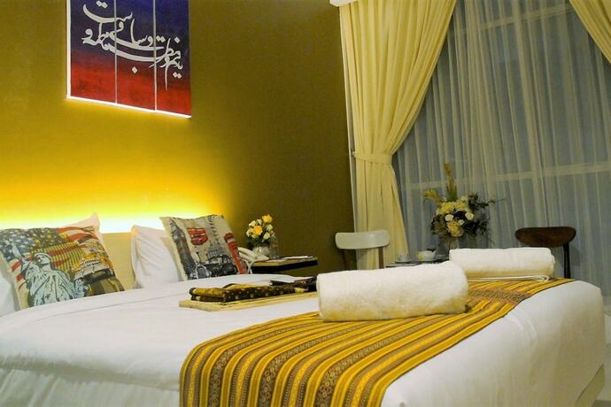 Imagen de la habitación del Hotel Hazotel Semarang. Foto 27